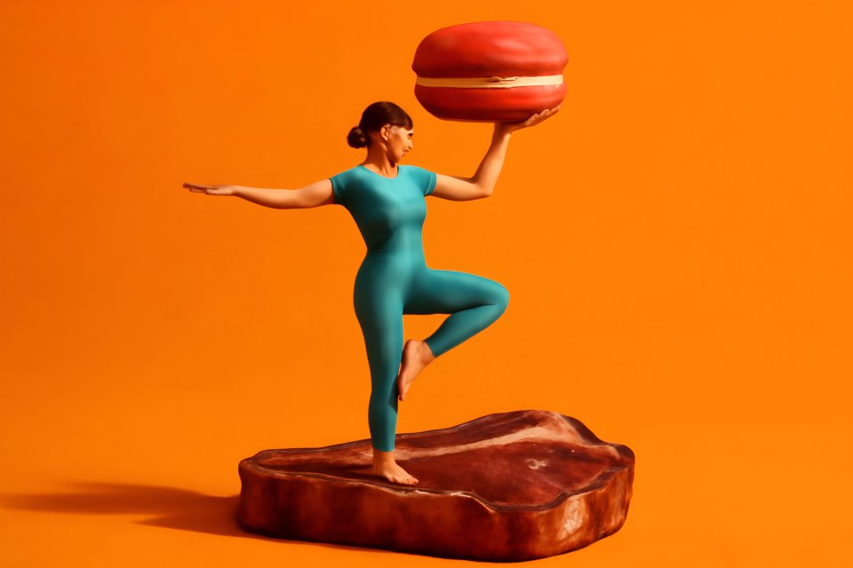 Woman balancing macaron on head
